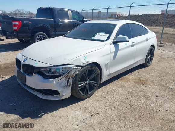2016 BMW 4 Series 428i with VIN WBA4A9C50GG505299, listed as a IAAI auction lot 41657501 with 89,856 mi miles. Bid and sale history available at carsss.com. Image 18.