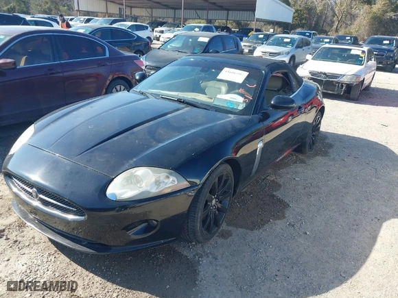 2007 Jaguar XK with VIN SAJDA44B975B01444, listed as a IAAI auction lot 41606094 with 155,227 mi miles. Bid and sale history available at carsss.com. Image 2.