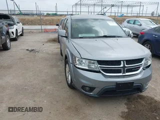 2017 Dodge Journey SXT z VIN 3C4PDCBG7HT588850, wystawiony jako IAAI lot #42292745 z przebiegiem 153 135 mil mil oraz . Historia ofert i sprzedaży dostępna na DreamBid. Obrazek 1.
