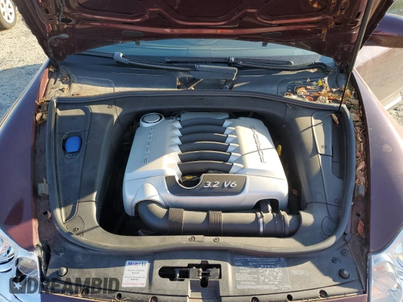 2005 Porsche Cayenne with VIN WP1AA29P05LA23943, listed as a Copart auction lot 70976984 with 49,336 mi miles and Salvage Title. Bid and sale history available at carsss.com. Image 12.