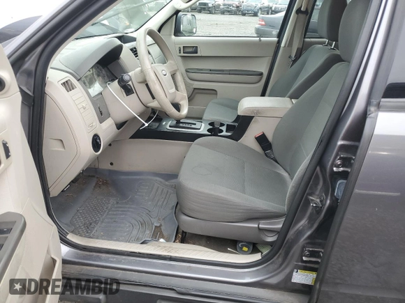2009 Ford Escape XLS z VIN 1FMCU92759KB19563, wystawiony jako Copart lot #86012594 z przebiegiem 98 615 mil mil oraz Czysty tytuł • Clean title. Historia ofert i sprzedaży dostępna na DreamBid. Obrazek 7.