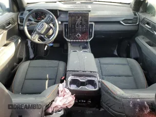 2024 GMC Acadia AWD AT4 z VIN 1GKENPKS7RJ174495, wystawiony jako Copart lot #82187344 z przebiegiem Nie podano mil oraz Szkoda całkowita • Salvage title. Historia ofert i sprzedaży dostępna na DreamBid. Obrazek 8.