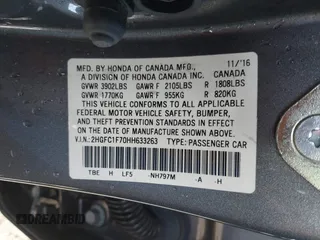 2017 Honda Civic Sedan EX-L with VIN 2HGFC1F70HH633263, listed as a IAAI auction lot 41511642 with 65,769 mi miles. Bid and sale history available at carsss.com. Image 9.