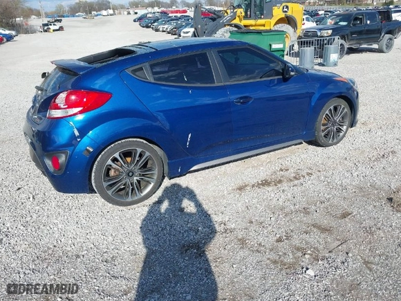 2016 Hyundai Veloster Turbo with VIN KMHTC6AE4GU260112, listed as a IAAI auction lot 41868273 with 130,853 mi miles. Bid and sale history available at carsss.com. Image 4.