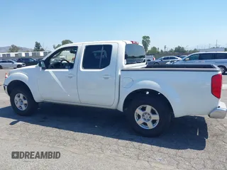 2005 Nissan Frontier LE with VIN 1N6AD07U75C456114, listed as a IAAI auction lot 42222661 with 165,651 mi miles and . Bid and sale history available at DreamBid. Image 14.
