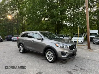 2016 Kia Sorento LX z VIN 5XYPGDA50GG134006, wystawiony jako Copart lot #59635165 z przebiegiem 140 201 mil mil oraz Czysty tytuł • Clean title. Historia ofert i sprzedaży dostępna na DreamBid. Obrazek 1.