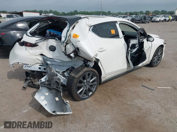 2023 Mazda 3 S Select with VIN JM1BPAKM3P1616743, listed as a IAAI auction lot 42248005 with Not provided miles and . Bid and sale history available at DreamBid. Image 4.