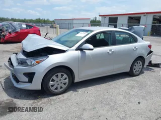 2023 Kia Rio S z VIN 3KPA24AD4PE604207, wystawiony jako IAAI lot #42077201 z przebiegiem 16 559 mil mil oraz . Historia ofert i sprzedaży dostępna na DreamBid. Obrazek 2.