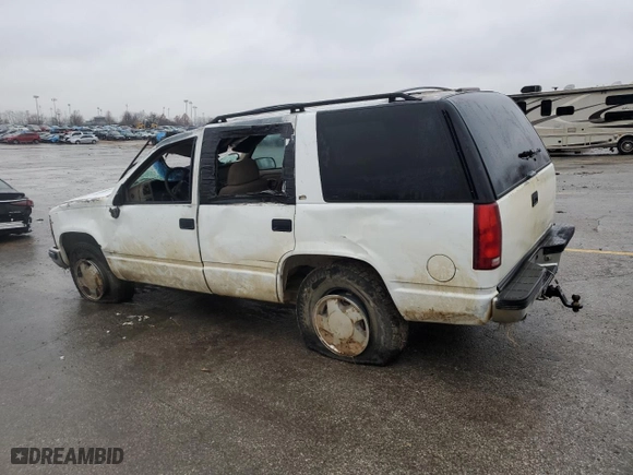 1998 Chevrolet Tahoe with VIN 1GNEK13R4WJ346191, listed as a Copart auction lot 86583514 with 2,650,816 mi miles and Salvage Title. Bid and sale history available at carsss.com. Image 2.