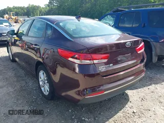 2018 Kia Optima LX z VIN 5XXGT4L39JG180260, wystawiony jako IAAI lot #42081495 z przebiegiem 173 200 mil mil oraz . Historia ofert i sprzedaży dostępna na DreamBid. Obrazek 3.