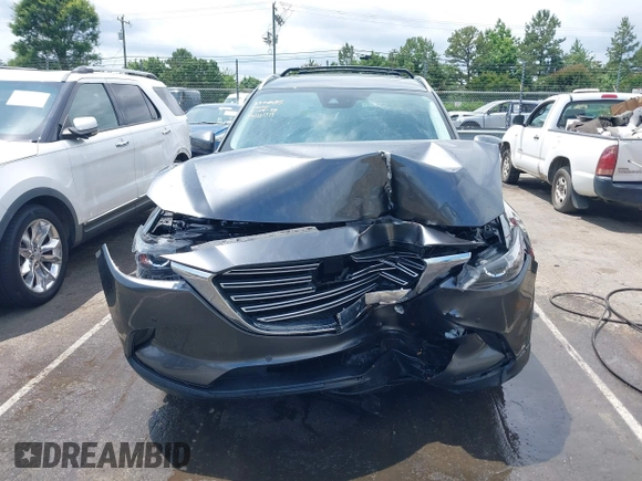 2019 Mazda CX-9 Touring with VIN JM3TCACY6K0334085, listed as a IAAI auction lot 42391595 with 113,723 mi miles and . Bid and sale history available at DreamBid. Image 6.