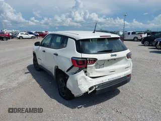 2018 Jeep Compass Sport with VIN 3C4NJCAB1JT151695, listed as a IAAI auction lot 42475636 with 77,607 mi miles and . Bid and sale history available at DreamBid. Image 3.