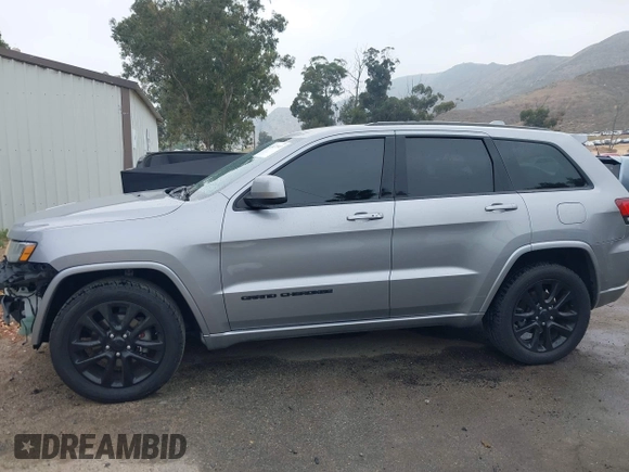 2017 Jeep Grand Cherokee Laredo with VIN 1C4RJEAG0HC702195, listed as a IAAI auction lot 42427597 with 104,403 mi miles and . Bid and sale history available at DreamBid. Image 15.