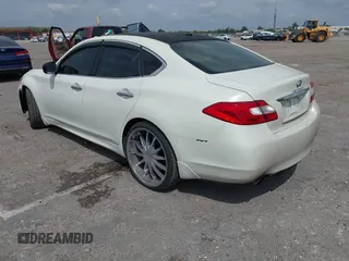 2011 Infiniti M with VIN JN1BY1AP7BM325701, listed as a IAAI auction lot 41861484 with 151,955 mi miles and . Bid and sale history available at DreamBid. Image 3.