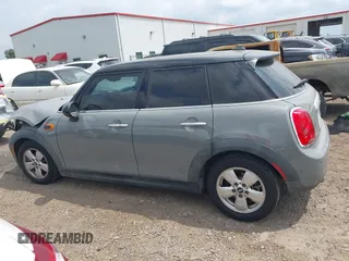 2015 MINI Hardtop 4 Door with VIN WMWXS5C56FT830418, listed as a IAAI auction lot 42132285 with 111,428 mi miles and . Bid and sale history available at DreamBid. Image 14.