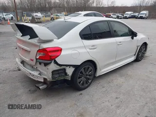 2015 Subaru WRX with VIN JF1VA1A67F9819707, listed as a IAAI auction lot 42021831 with 104,706 mi miles. Bid and sale history available at carsss.com. Image 4.