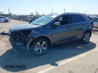 2019 Ford Edge SEL z VIN 2FMPK3J92KBC63577, wystawiony jako IAAI lot #41948953 z przebiegiem 72 551 mil mil oraz . Historia ofert i sprzedaży dostępna na DreamBid. Obrazek 2.