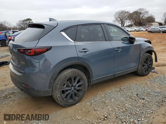 2023 Mazda CX-5 S Carbon Edition with VIN JM3KFBCM9P0280049, listed as a Copart auction lot 85712024 with 13,694 mi miles and Salvage Title. Bid and sale history available at DreamBid. Image 3.