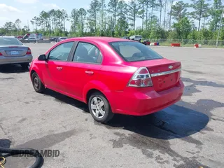 2011 Chevrolet Aveo 1LT with VIN KL1TD5DE9BB164124, listed as a IAAI auction lot 41903497 with 157,329 mi miles and . Bid and sale history available at DreamBid. Image 3.