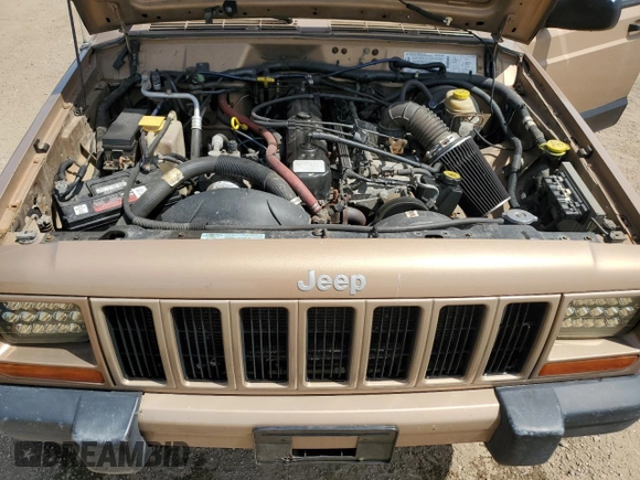 2000 Jeep Cherokee Classic с VIN 1J4FF58S7YL134763, выставлен на аукционе Copart как лот 55957205 с пробегом 229 160 миль миль и Списание • Salvage title. История ставок и продаж доступна на DreamBid. Изображение 11.
