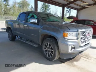 2021 GMC Canyon 4WD Denali with VIN 1GTG6EEN5M1102747, listed as a IAAI auction lot 42121134 with 60,412 mi miles and . Bid and sale history available at carsss.com. Image 1.