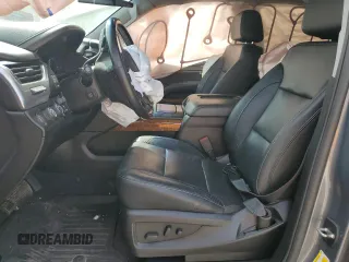 2020 Chevrolet Tahoe Premier with VIN 1GNSKCKC7LR125399, listed as a Copart auction lot 54702635 with 134,684 mi miles and Salvage title. Bid and sale history available at DreamBid. Image 7.
