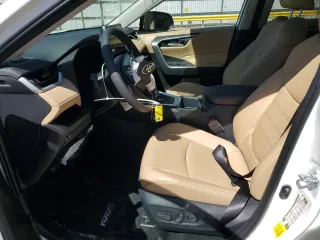 2025 Toyota RAV4 Hybrid XLE Premium with VIN 2T3B6RFVXSW084227, listed as a Copart auction lot 48907275 with 1,692 mi miles and Salvage Title. Bid and sale history available at DreamBid. Image 7.