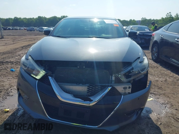 2017 Nissan Maxima SV z VIN 1N4AA6AP7HC454942, wystawiony jako IAAI lot #42447538 z przebiegiem 199 525 mil mil oraz . Historia ofert i sprzedaży dostępna na DreamBid. Obrazek 13.