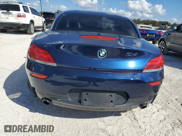 2013 BMW Z4 sDrive35i with VIN WBALM7C58DE385458, listed as a Copart auction lot 77959004 with 43,616 mi miles and Salvage Title. Bid and sale history available at carsss.com. Image 6.