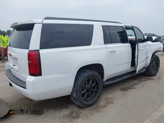 2016 Chevrolet Suburban LT with VIN 1GNSKHKC9GR263027, listed as a IAAI auction lot 42463711 with Not provided miles and . Bid and sale history available at DreamBid. Image 4.