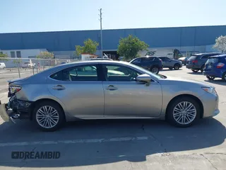 2015 Lexus ES with VIN JTHBK1GG3F2196961, listed as a IAAI auction lot 42003591 with 82,580 mi miles. Bid and sale history available at carsss.com. Image 13.