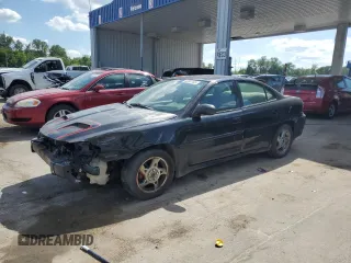 2004 Pontiac Grand Am GT with VIN 1G2NW52E94M694068, listed as a Copart auction lot 62987445 with Not provided miles and Salvage title. Bid and sale history available at DreamBid. Image 1.