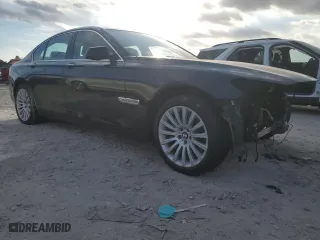 2012 BMW 7 Series 750i xDrive with VIN WBAKC6C58CC396835, listed as a Copart auction lot 86833724 with 0 mi miles and Salvage Title. Bid and sale history available at carsss.com. Image 4.