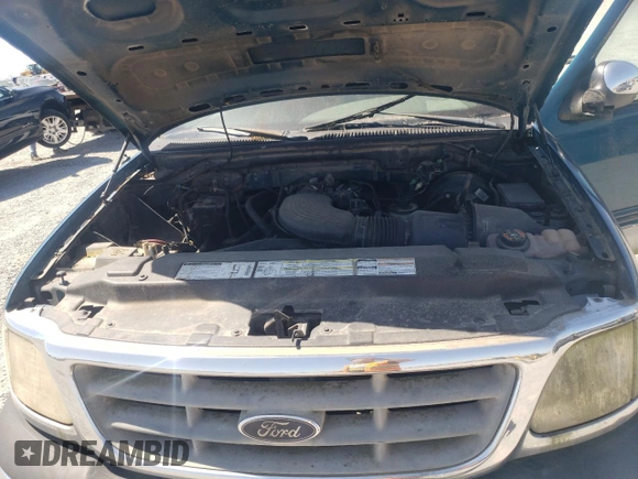 2000 Ford F-150 XL z VIN 1FTRX17W4YKA07388, wystawiony jako Copart lot #53160325 z przebiegiem Nie podano mil oraz Czysty tytuł • Clean title. Historia ofert i sprzedaży dostępna na DreamBid. Obrazek 11.