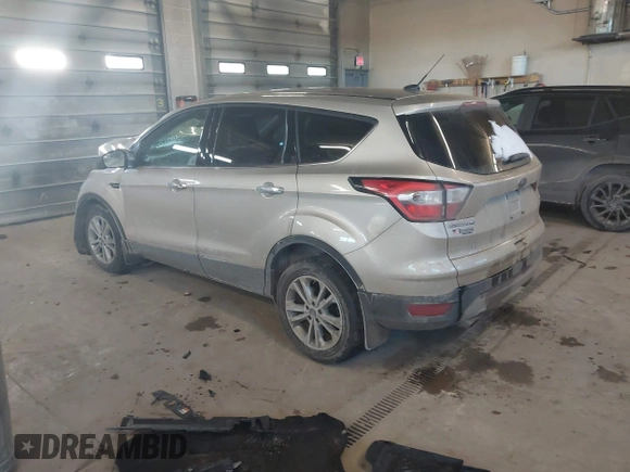 2017 Ford Escape SE z VIN 1FMCU0GD0HUC93439, wystawiony jako IAAI lot #41447523 z przebiegiem 94 776 mil mil oraz . Historia ofert i sprzedaży dostępna na DreamBid. Obrazek 3.