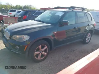 2010 BMW X5 35d with VIN 5UXFF0C52ALJ99499, listed as a IAAI auction lot 42109157 with 126,797 mi miles. Bid and sale history available at carsss.com. Image 2.