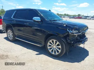 2021 Chevrolet Tahoe Premier with VIN 1GNSKSKDXMR195984, listed as a IAAI auction lot 42528305 with 89,925 mi miles and . Bid and sale history available at DreamBid. Image 1.