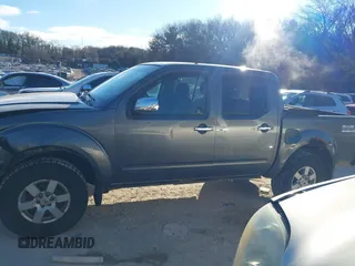 2006 Nissan Frontier SE with VIN 1N6AD07W26C402027, listed as a IAAI auction lot 41249886 with 155,417 mi miles and . Bid and sale history available at DreamBid. Image 14.