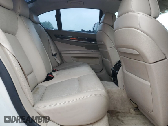 2012 BMW 7 Series 750i z VIN WBAKA8C51CCY37495, wystawiony jako Copart lot #56914295 z przebiegiem 126 697 mil mil oraz Czysty tytuł • Clean title. Historia ofert i sprzedaży dostępna na DreamBid. Obrazek 10.