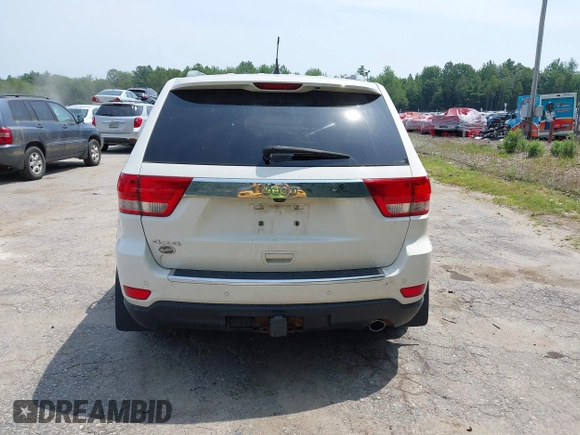 2011 Jeep Grand Cherokee Overland with VIN 1J4RR6GG3BC587857, listed as a IAAI auction lot 42879845 with 165,572 mi miles and . Bid and sale history available at DreamBid. Image 16.