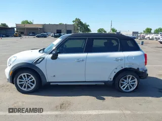 2016 MINI Countryman S z VIN WMWZC5C57GWU00192, wystawiony jako IAAI lot #42345660 z przebiegiem 57 683 mil mil oraz . Historia ofert i sprzedaży dostępna na DreamBid. Obrazek 14.