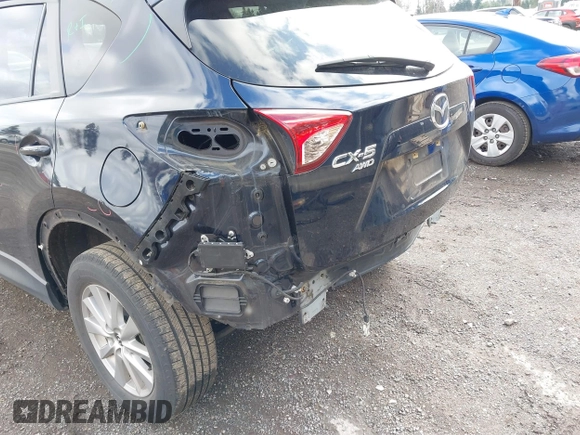 2015 Mazda CX-5 Touring with VIN JM3KE4CY5F0453646, listed as a IAAI auction lot 41740574 with 91,167 mi miles. Bid and sale history available at carsss.com. Image 6.