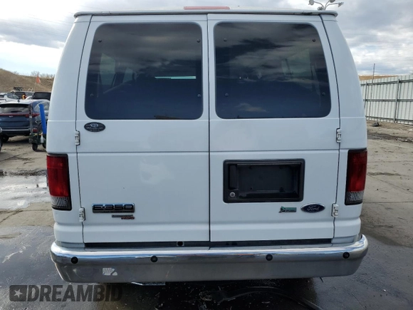 2011 Ford Econoline Passenger XL with VIN 1FBNE3BL4BDA67376, listed as a Copart auction lot 41890935 with 171,949 mi miles and Salvage Title. Bid and sale history available at carsss.com. Image 6.