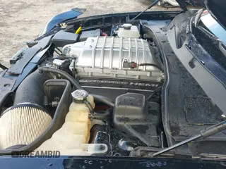 2021 Dodge Charger SRT Hellcat Redeye Widebody with VIN 2C3CDXL98MH620606, listed as a IAAI auction lot 42435270 with 30,819 mi miles and . Bid and sale history available at DreamBid. Image 25.