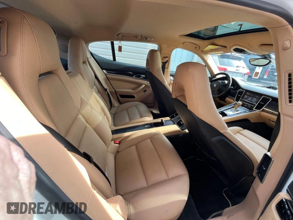2013 Porsche Panamera z VIN WP0AA2A74DL016182, wystawiony jako Copart lot #89269425 z przebiegiem 119 089 mil mil oraz Czysty tytuł • Clean title. Historia ofert i sprzedaży dostępna na DreamBid. Obrazek 6.