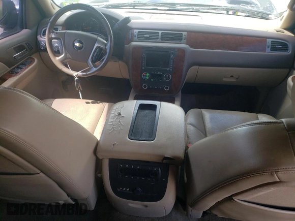 2009 Chevrolet Tahoe LTZ with VIN 1GNFK33039J125428, listed as a Copart auction lot 57962875 with 245,554 mi miles and Salvage title. Bid and sale history available at DreamBid. Image 8.