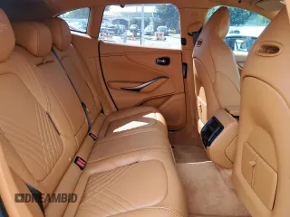 2021 Aston Martin DBX z VIN SCFVUJAW7MTV03341, wystawiony jako Copart lot #71015804 z przebiegiem 12 324 mil mil oraz Szkody całkowita. Historia ofert i sprzedaży dostępna na DreamBid. Obrazek 11.
