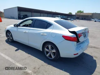 2013 Acura ILX Premium z VIN 19VDE1F54DE010709, wystawiony jako IAAI lot #42433260 z przebiegiem 243 436 mil mil oraz . Historia ofert i sprzedaży dostępna na DreamBid. Obrazek 3.