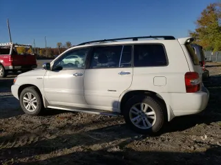 2007 Toyota Highlander Hybrid w/3rd Row with VIN JTEEW21A770038130, listed as a Copart auction lot 76514114 with 210,581 mi miles and Clean Title. Bid and sale history available at carsss.com. Image 2.