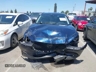 2023 Mazda CX-30 S Select with VIN 3MVDMBBM3PM514030, listed as a IAAI auction lot 42326959 with 41,226 mi miles and . Bid and sale history available at DreamBid. Image 12.